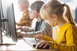 Child using a computer – integrating tech in early childhood learning environments