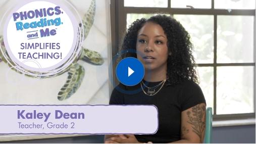 Testimonial video thumbnail for Phonics, Reading & Me, showing a smiling teacher with a play button overlay, sharing classroom success stories.