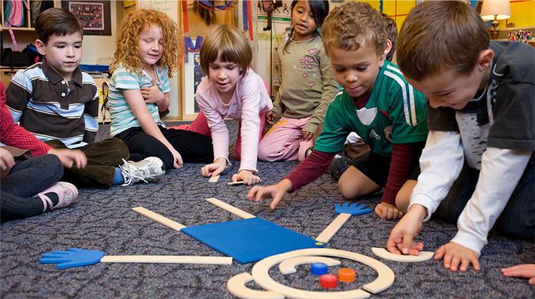 Students building Mat Man